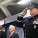 Chief of Space Operations Bradley Chance Saltzman stands in full dress uniform, staring ahead and saluting.